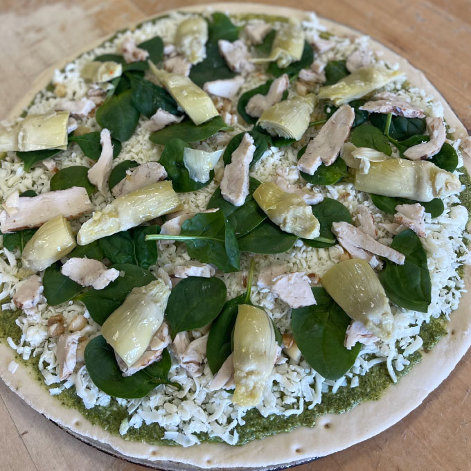 Chicken, spinach and artichoke pizza